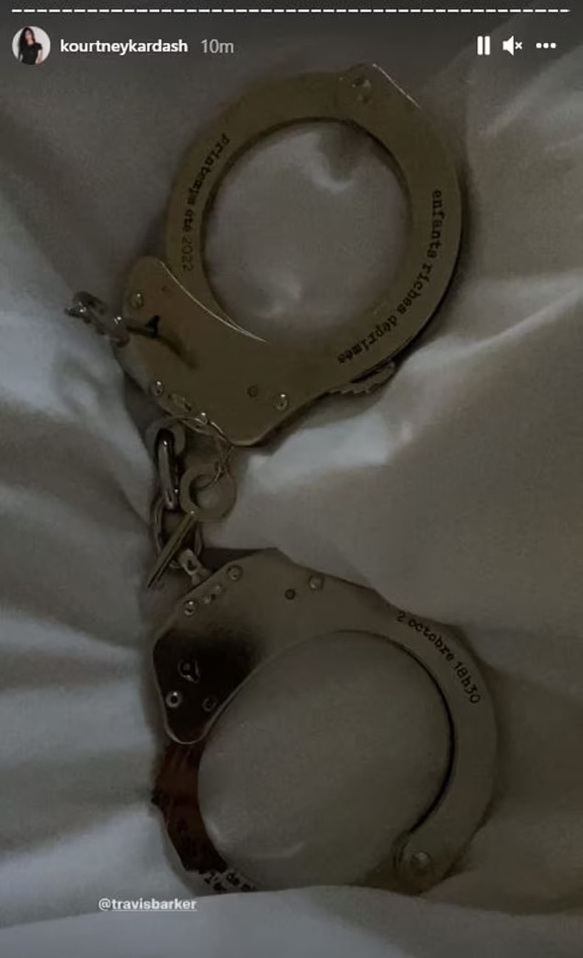Kourtney Kardashian Travis Barker Handcuffs Wedding Date
